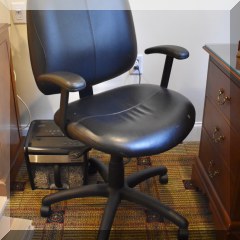 F31. Leatherette office chair. Some peeling on seat. 44” h x 24”w - $48 
